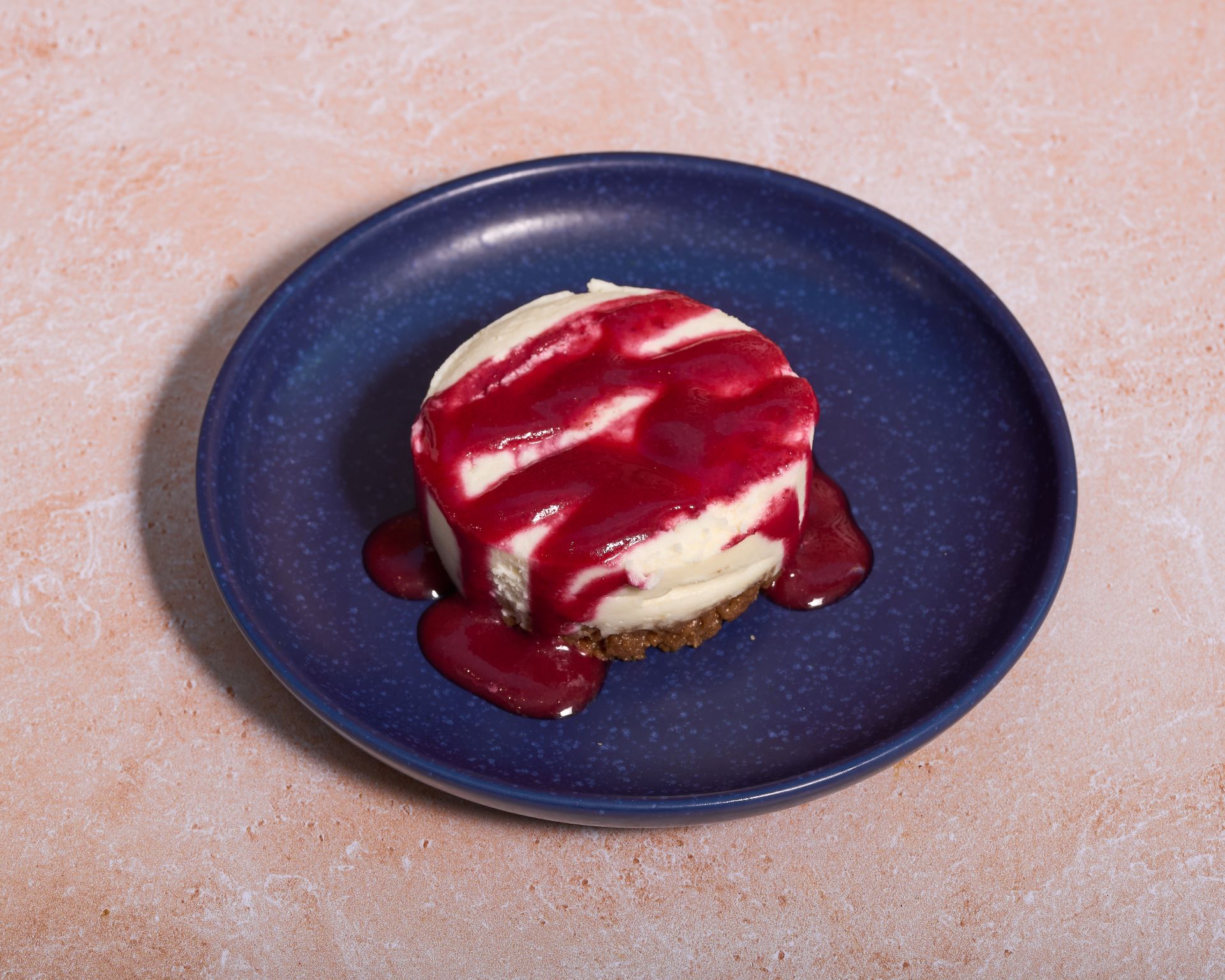 Cheesecake & coulis de fruits rouges