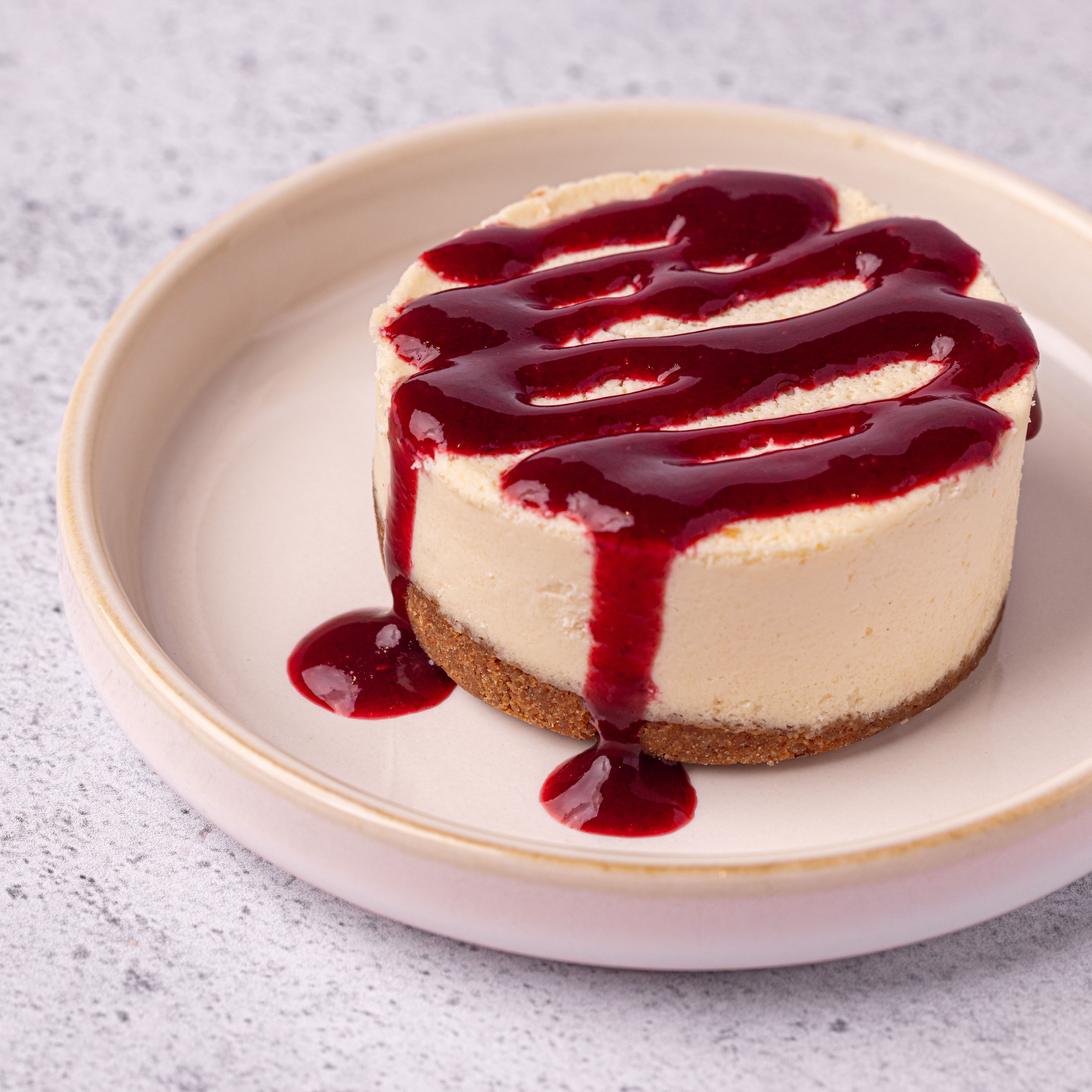 Cheesecake & coulis de fruits rouges
